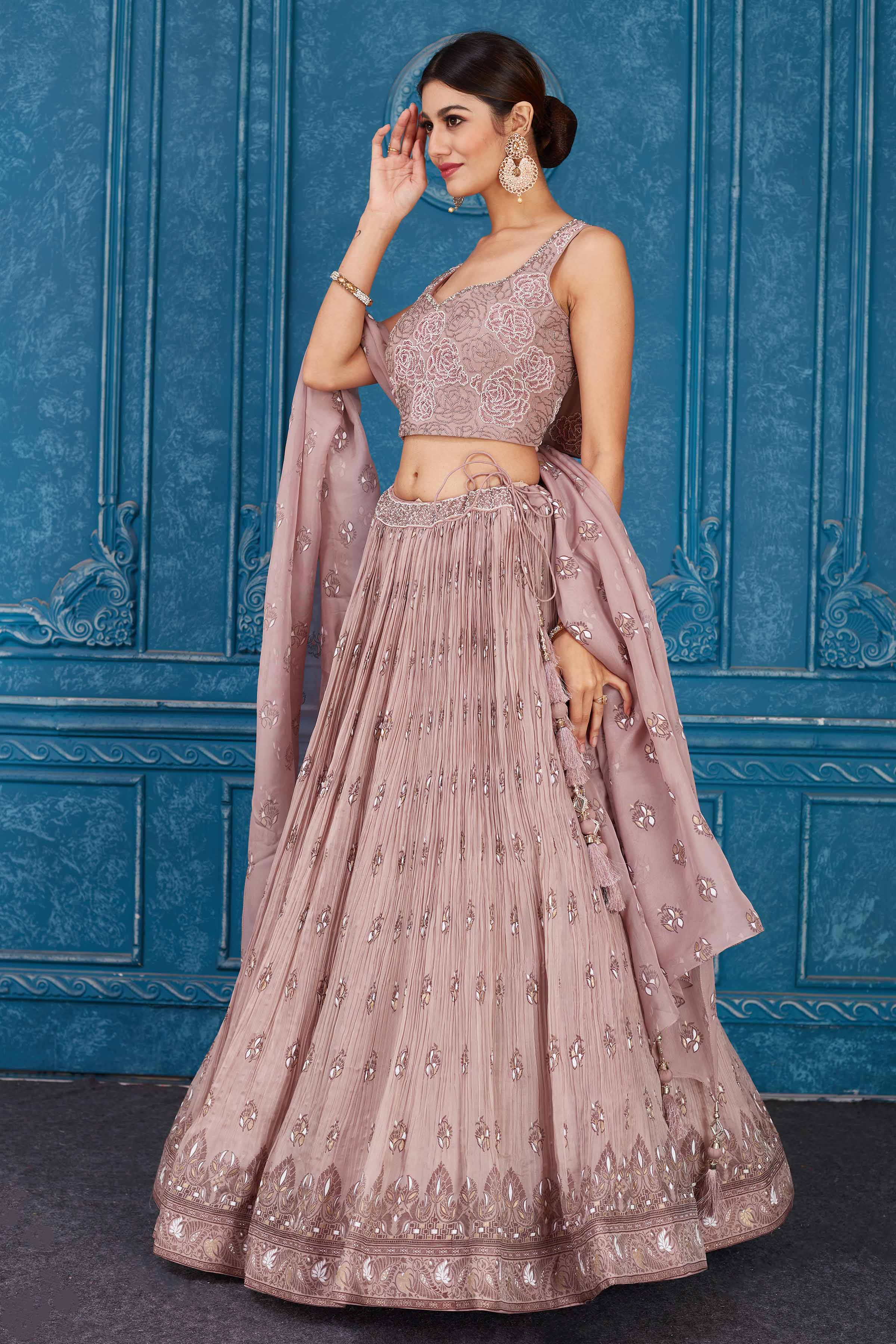 Buy dusty pink floral embroidered georgette lehenga online in USA with dupatta. Slay in style at wedding festivities in this beautiful designer lehengas. hand embroidered lehengas, Bollywood lehenga, Anarkali suits, sharara suits from Pure Elegance Indian saree store in USA. -side