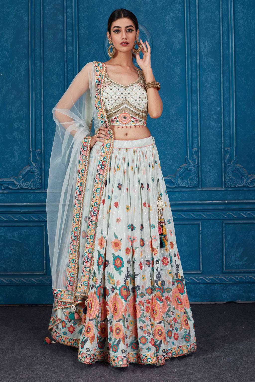Shop stunning mint green floral embroidered georgette lehenga online in USA with dupatta. Slay in style at wedding festivities in this beautiful designer lehengas. hand embroidered lehengas, Bollywood lehenga, Anarkali suits, sharara suits from Pure Elegance Indian saree store in USA. -full view