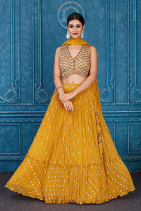 Shop beautiful mustard embroidered georgette lehenga online in USA with dupatta. Slay in style at wedding festivities in this beautiful designer lehengas. hand embroidered lehengas, Bollywood lehenga, Anarkali suits, sharara suits from Pure Elegance Indian saree store in USA. -full view