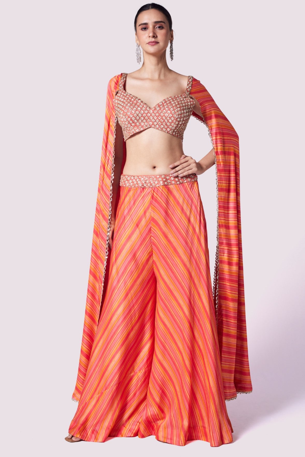 Shop stunning orange striped crepe sleeves co-ord set online in USA. Shop the best and latest designs in embroidered sarees, designer sarees, Anarkali suit, lehengas, sharara suits for weddings and special occasions from Pure Elegance Indian fashion store in USA.-full view