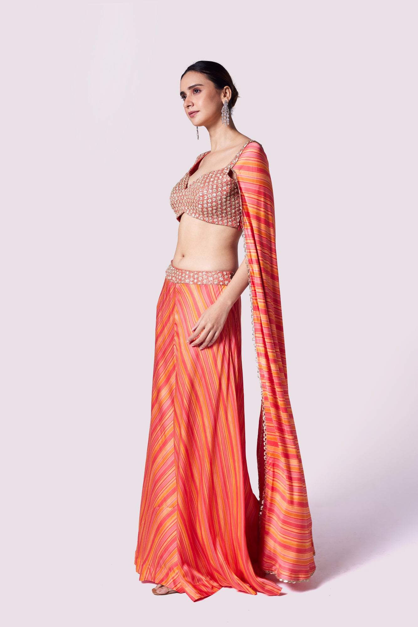 Shop stunning orange striped crepe sleeves co-ord set online in USA. Shop the best and latest designs in embroidered sarees, designer sarees, Anarkali suit, lehengas, sharara suits for weddings and special occasions from Pure Elegance Indian fashion store in USA.-side