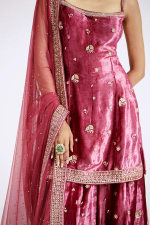 Shop pink velvet embroidered sharara suit online in USA with dupatta. Shop the best and latest designs in embroidered sarees, designer sarees, Anarkali suit, lehengas, sharara suits for weddings and special occasions from Pure Elegance Indian fashion store in USA.-sharara