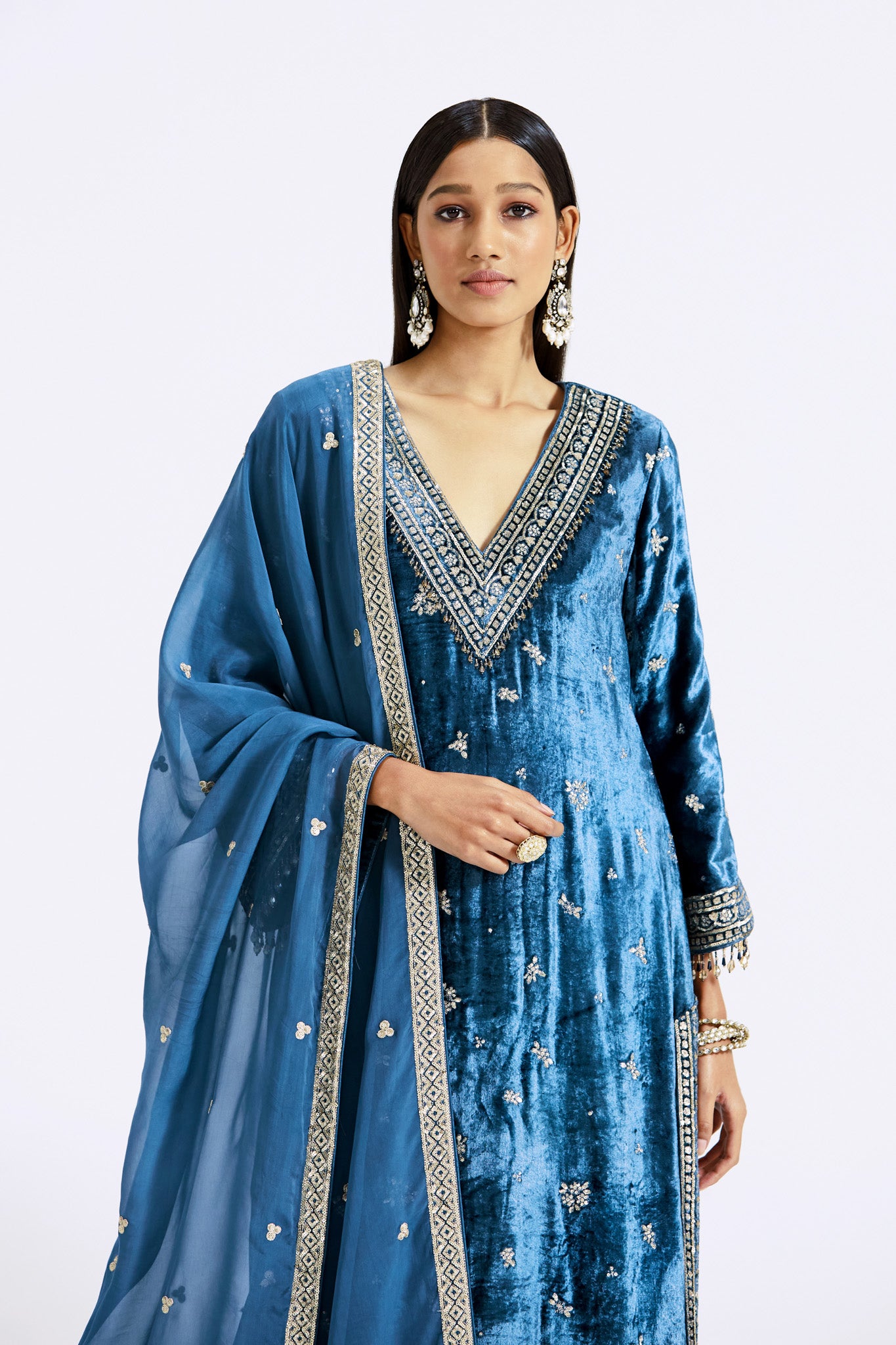 Buy blue velvet embroidered sharara suit online in USA with dupatta. Shop the best and latest designs in embroidered sarees, designer sarees, Anarkali suit, lehengas, sharara suits for weddings and special occasions from Pure Elegance Indian fashion store in USA.-closeup