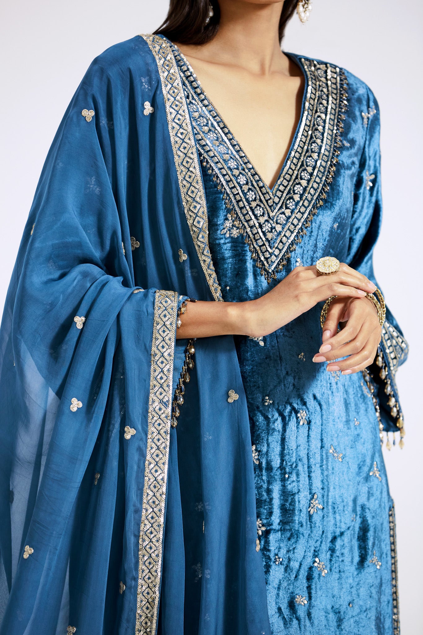Buy blue velvet embroidered sharara suit online in USA with dupatta. Shop the best and latest designs in embroidered sarees, designer sarees, Anarkali suit, lehengas, sharara suits for weddings and special occasions from Pure Elegance Indian fashion store in USA.-closeup