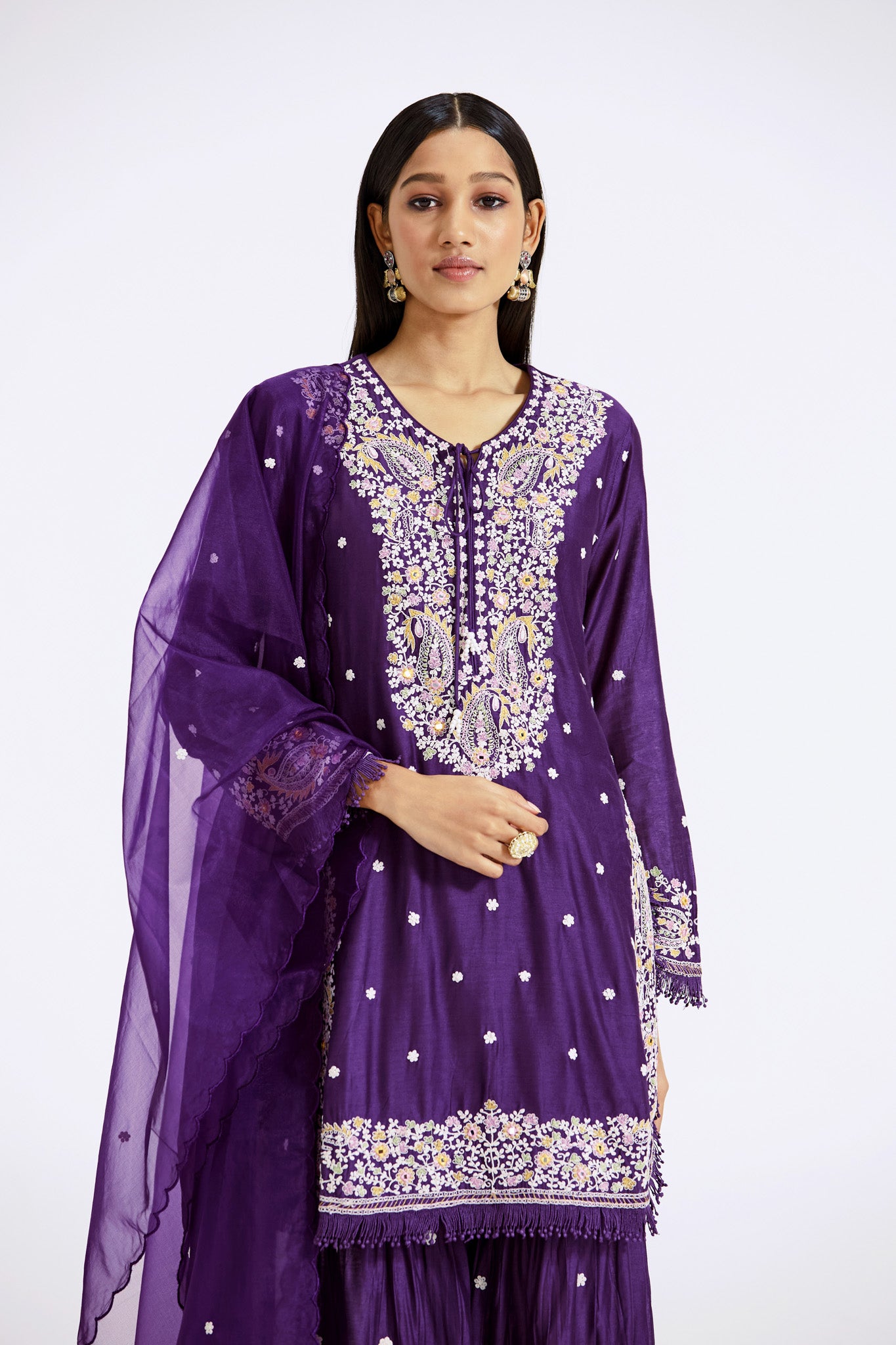 Shop purple embroidered organza sharara suit online in USA with dupatta. Shop the best and latest designs in embroidered sarees, designer sarees, Anarkali suit, lehengas, sharara suits for weddings and special occasions from Pure Elegance Indian fashion store in USA.-closeup