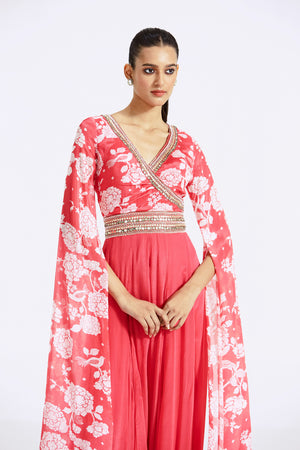 Buy pink printed chinon jumpsuit online in USA with cape sleeves. Shop the best and latest designs in embroidered sarees, designer sarees, Anarkali suit, lehengas, sharara suits for weddings and special occasions from Pure Elegance Indian fashion store in USA.-closeup