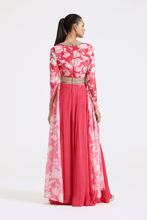 Buy pink printed chinon jumpsuit online in USA with cape sleeves. Shop the best and latest designs in embroidered sarees, designer sarees, Anarkali suit, lehengas, sharara suits for weddings and special occasions from Pure Elegance Indian fashion store in USA.-back