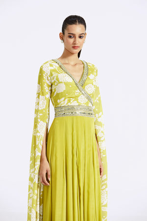 Shop beautiful lime green printed chinon jumpsuit online in USA with cape sleeves. Shop the best and latest designs in embroidered sarees, designer sarees, Anarkali suit, lehengas, sharara suits for weddings and special occasions from Pure Elegance Indian fashion store in USA.-closeup