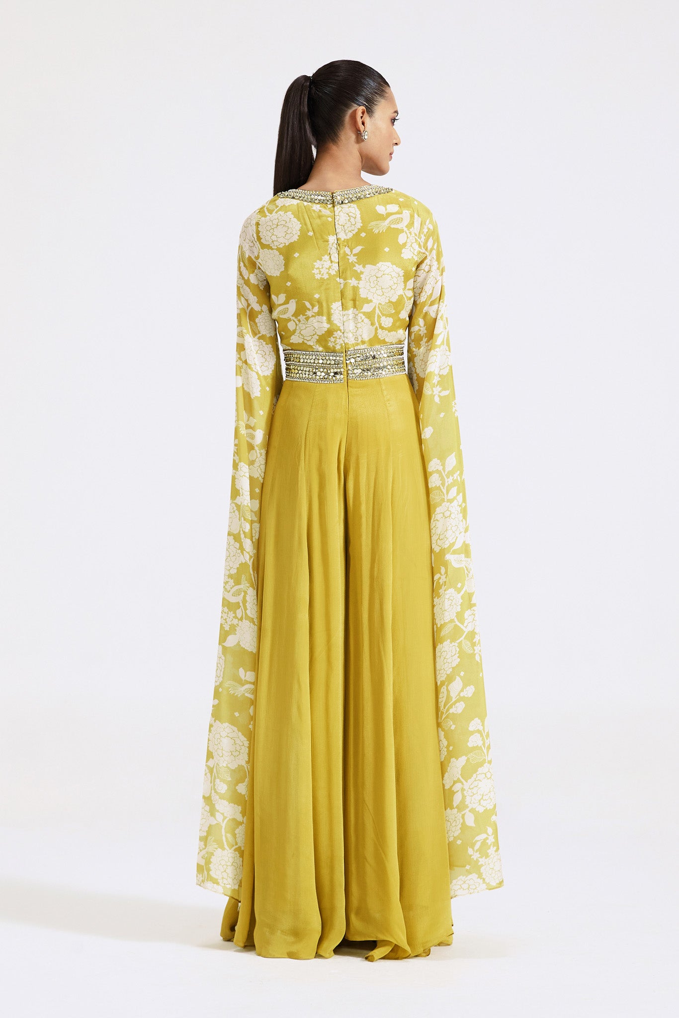 Shop beautiful lime green printed chinon jumpsuit online in USA with cape sleeves. Shop the best and latest designs in embroidered sarees, designer sarees, Anarkali suit, lehengas, sharara suits for weddings and special occasions from Pure Elegance Indian fashion store in USA.-back
