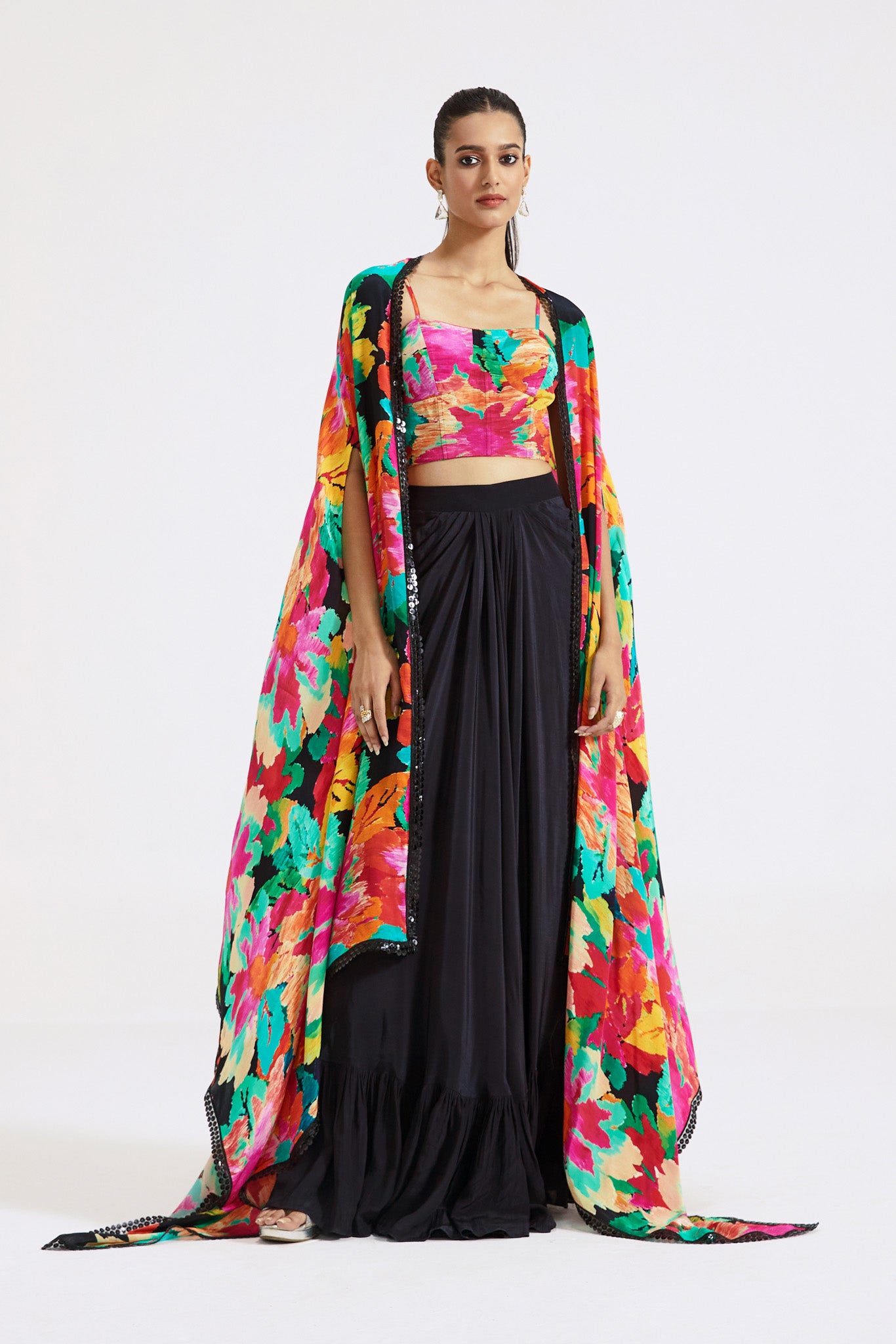 Buy multicolor black crepe draped skirt set online in USA with cape. Shop the best and latest designs in embroidered sarees, designer sarees, Anarkali suit, lehengas, sharara suits for weddings and special occasions from Pure Elegance Indian fashion store in USA.-full view