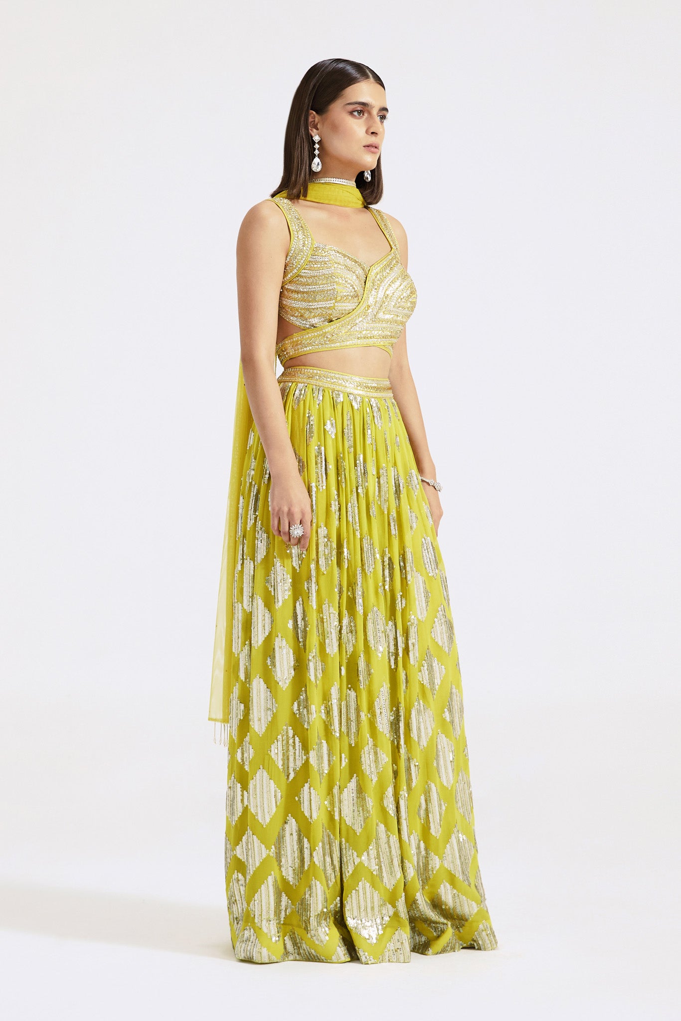Shop beautiful lime green cutdana and mirror work skirt set online in USA. Shop the best and latest designs in embroidered sarees, designer sarees, Anarkali suit, lehengas, sharara suits for weddings and special occasions from Pure Elegance Indian fashion store in USA.-side