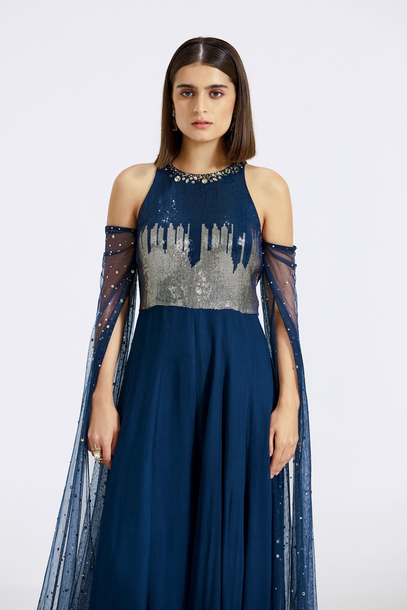 Shop blue georgette sequin jumpsuit online in USA with net sleeves. Shop the best and latest designs in embroidered sarees, designer sarees, Anarkali suit, lehengas, sharara suits for weddings and special occasions from Pure Elegance Indian fashion store in USA.-closeup
