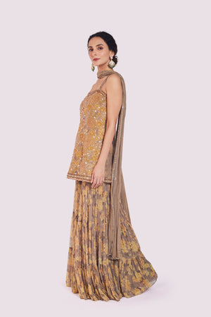 Shop beige floral georgette sharara suit online in USA with dupatta. Shop the best and latest designs in embroidered sarees, designer sarees, Anarkali suit, lehengas, sharara suits for weddings and special occasions from Pure Elegance Indian fashion store in USA.-suit