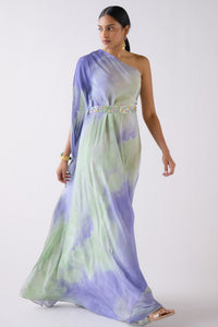 Buy lilac one shoulder crepe gown online in USA with embroidered belt. Shop the best and latest designs in embroidered sarees, designer sarees, Anarkali suit, lehengas, sharara suits for weddings and special occasions from Pure Elegance Indian fashion store in USA.-full view