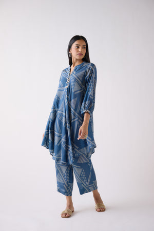 Shop stunning blue floral muslin co-ord set online in USA. Shop the best and latest designs in embroidered sarees, designer sarees, Anarkali suit, lehengas, sharara suits for weddings and special occasions from Pure Elegance Indian fashion store in USA.-side