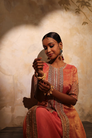 Shop orange tissue embroidered kurta online in USA with chanderi pants. Shop the best and latest designs in embroidered sarees, designer sarees, Anarkali suit, lehengas, sharara suits for weddings and special occasions from Pure Elegance Indian fashion store in USA.-closeup