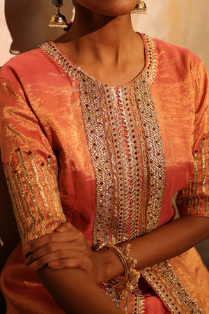 Shop orange tissue embroidered kurta online in USA with chanderi pants. Shop the best and latest designs in embroidered sarees, designer sarees, Anarkali suit, lehengas, sharara suits for weddings and special occasions from Pure Elegance Indian fashion store in USA.-embroidery