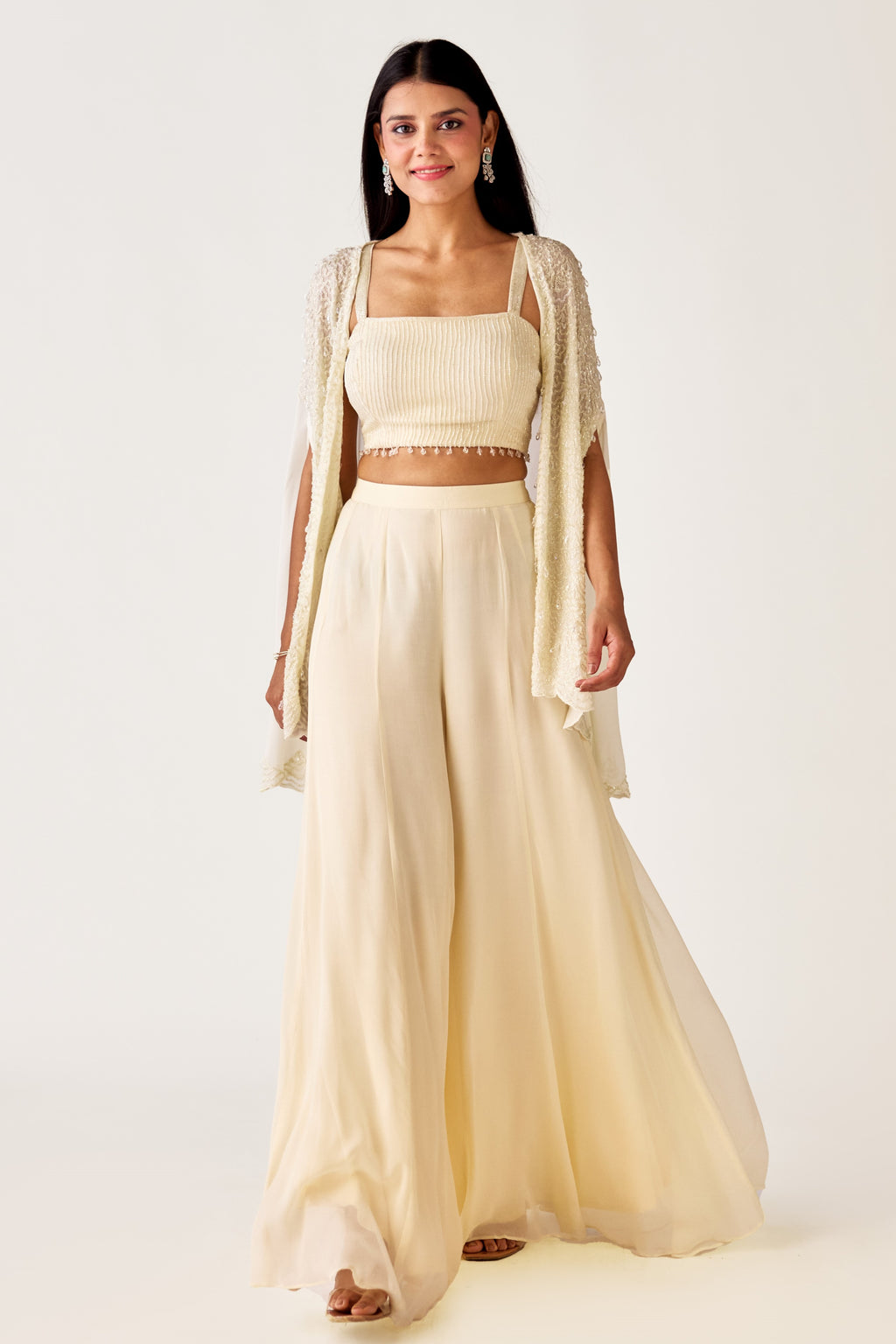 Buy ivory embroidered georgette sharara set online in USA with jacket. Shop the best and latest designs in embroidered sarees, designer sarees, Anarkali suit, lehengas, sharara suits for weddings and special occasions from Pure Elegance Indian fashion store in USA.-full view