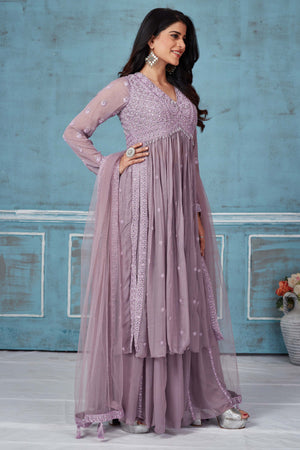 Buy lavender embroidered georgette palazzo suit online in USA with dupatta. Look royal on special occasions in exquisite designer lehengas, pure silk sarees, handloom sarees, Bollywood sarees, Anarkali suits, Banarasi sarees, organza sarees from Pure Elegance Indian saree store in USA.-side