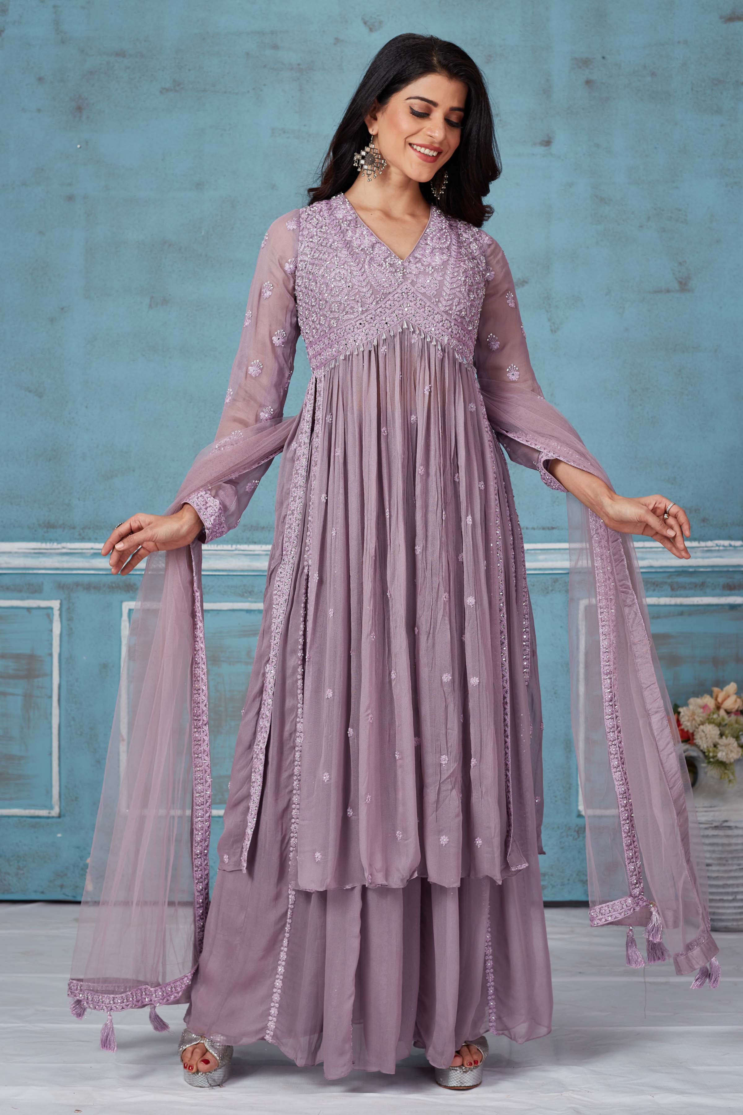 Buy lavender embroidered georgette palazzo suit online in USA with dupatta. Look royal on special occasions in exquisite designer lehengas, pure silk sarees, handloom sarees, Bollywood sarees, Anarkali suits, Banarasi sarees, organza sarees from Pure Elegance Indian saree store in USA.-full view