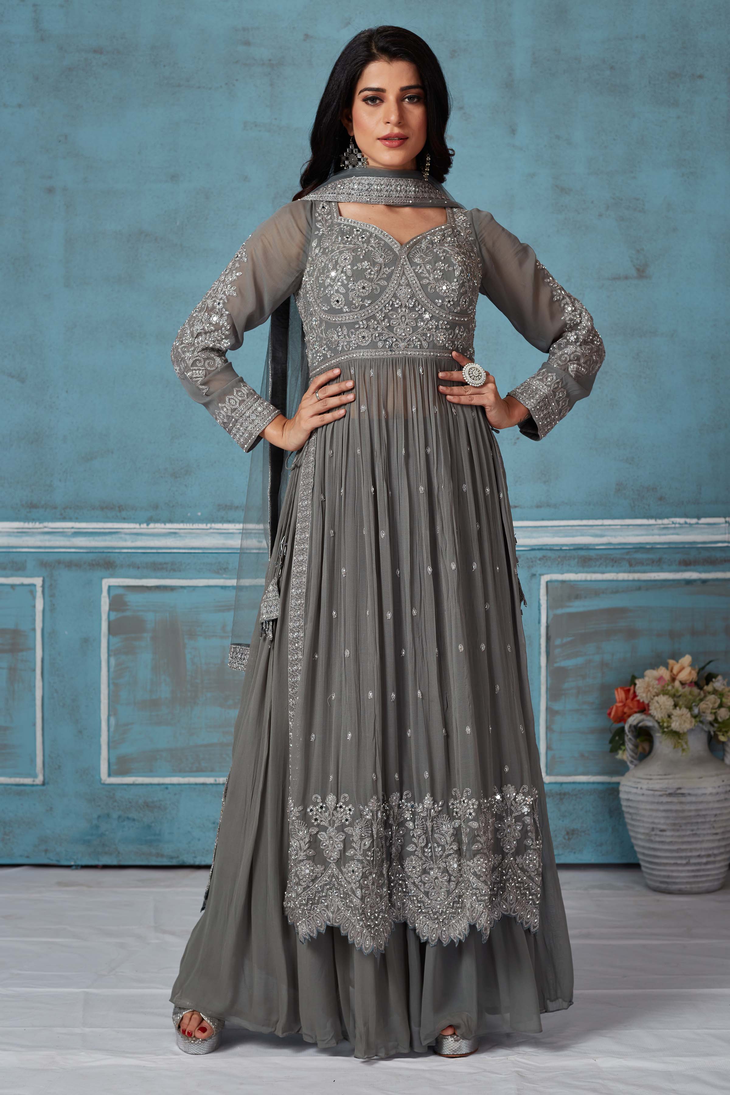  Buy grey embroidered georgette palazzo suit online in USA with dupatta. Look royal on special occasions in exquisite designer lehengas, pure silk sarees, handloom sarees, Bollywood sarees, Anarkali suits, Banarasi sarees, organza sarees from Pure Elegance Indian saree store in USA.-front
