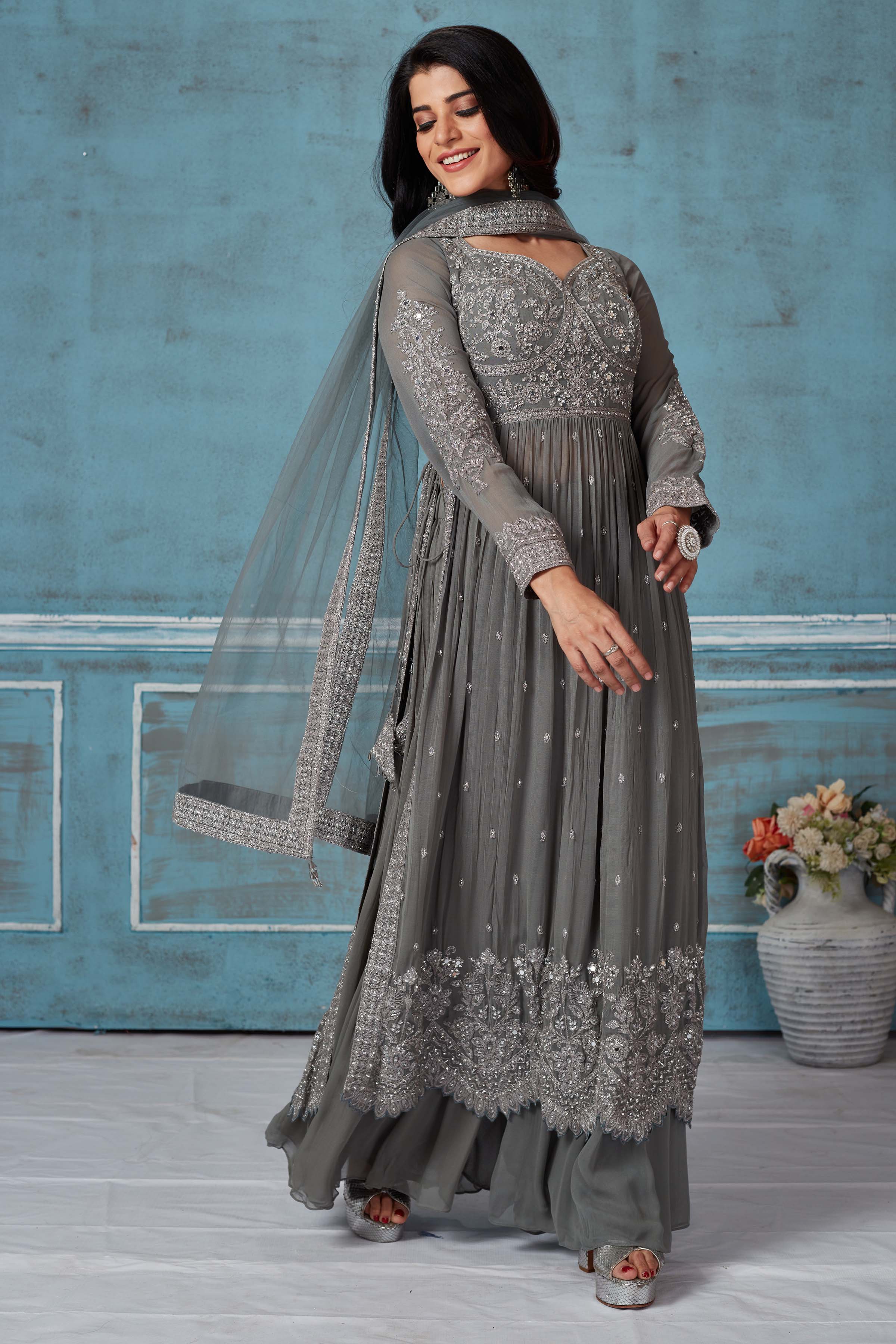  Buy grey embroidered georgette palazzo suit online in USA with dupatta. Look royal on special occasions in exquisite designer lehengas, pure silk sarees, handloom sarees, Bollywood sarees, Anarkali suits, Banarasi sarees, organza sarees from Pure Elegance Indian saree store in USA.-side