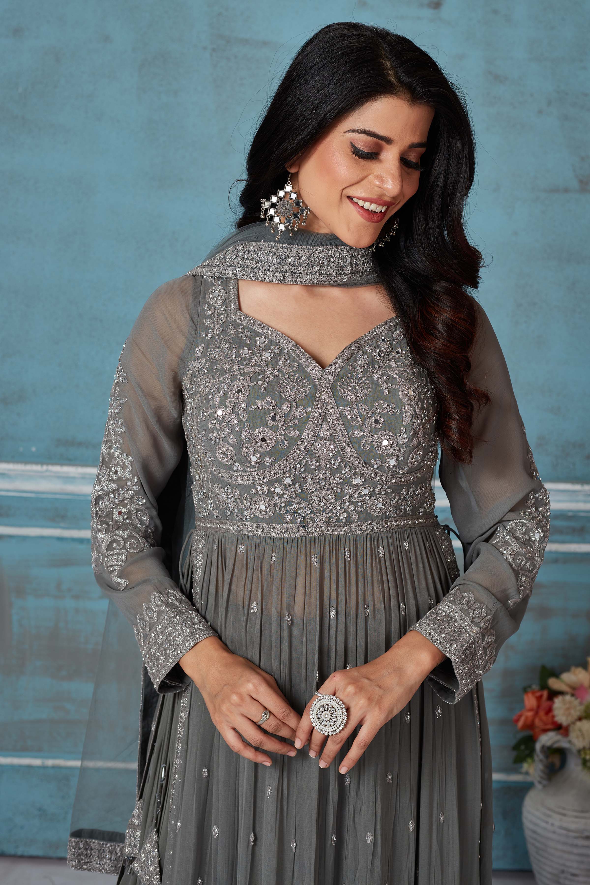  Buy grey embroidered georgette palazzo suit online in USA with dupatta. Look royal on special occasions in exquisite designer lehengas, pure silk sarees, handloom sarees, Bollywood sarees, Anarkali suits, Banarasi sarees, organza sarees from Pure Elegance Indian saree store in USA.-closeup