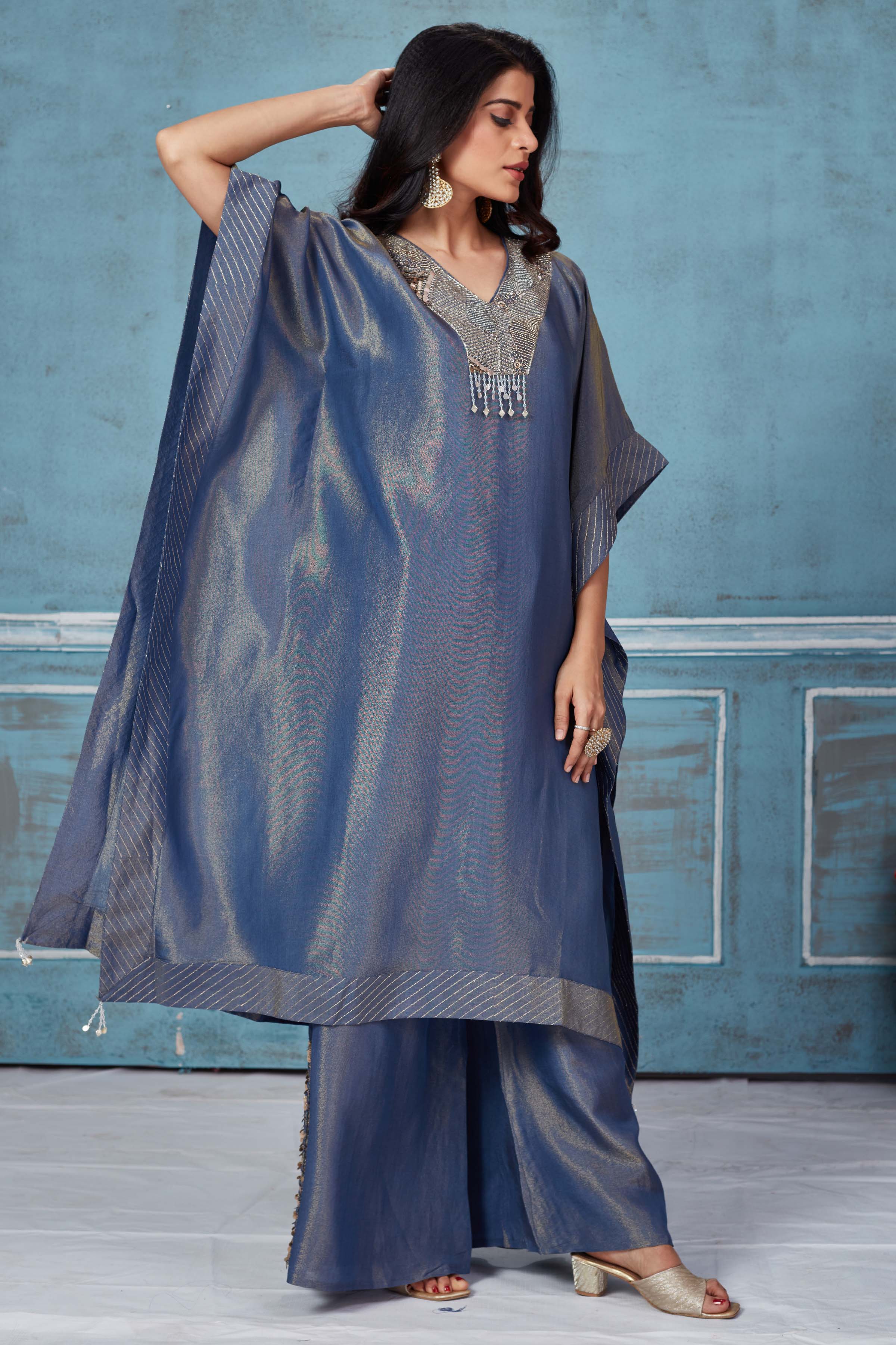 Shop beautiful blue embroidered tissue georgette kaftan pant set online in USA. Look royal on special occasions in exquisite designer lehengas, pure silk sarees, handloom sarees, Bollywood sarees, Anarkali suits, Banarasi sarees, organza sarees from Pure Elegance Indian saree store in USA.-side