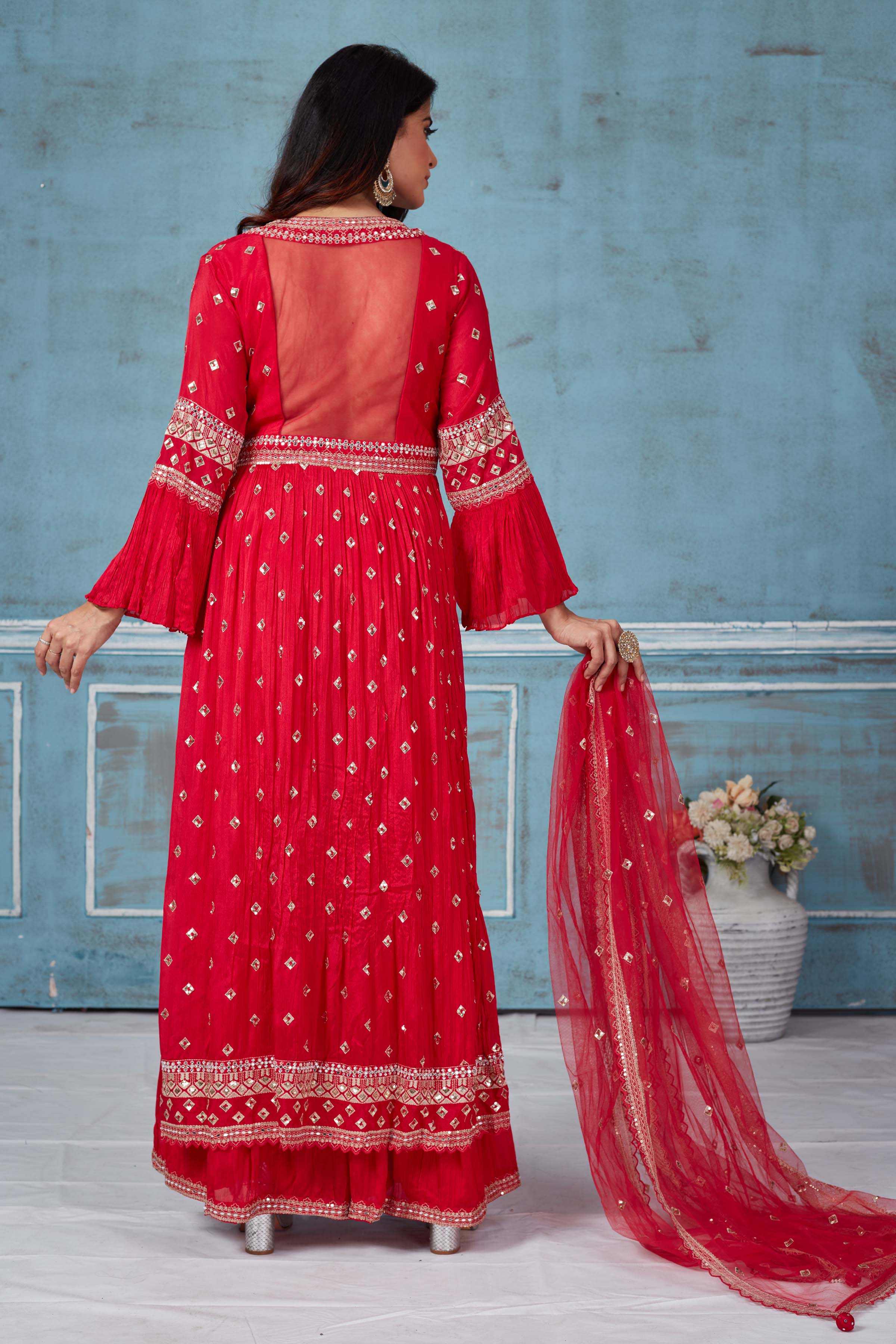 Shop red embroidered georgette palazzo online in USA with dupatta. Look royal on special occasions in exquisite designer lehengas, pure silk sarees, handloom sarees, Bollywood sarees, Anarkali suits, Banarasi sarees, organza sarees from Pure Elegance Indian saree store in USA.-back