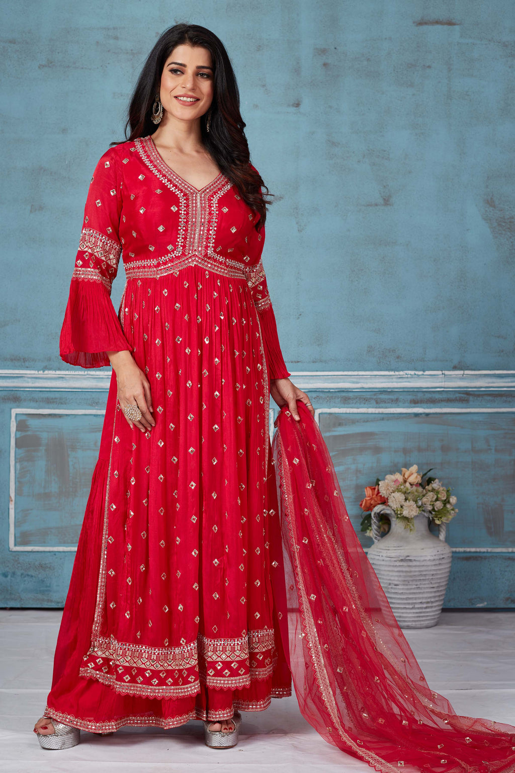 Shop red embroidered georgette palazzo online in USA with dupatta. Look royal on special occasions in exquisite designer lehengas, pure silk sarees, handloom sarees, Bollywood sarees, Anarkali suits, Banarasi sarees, organza sarees from Pure Elegance Indian saree store in USA.-full view