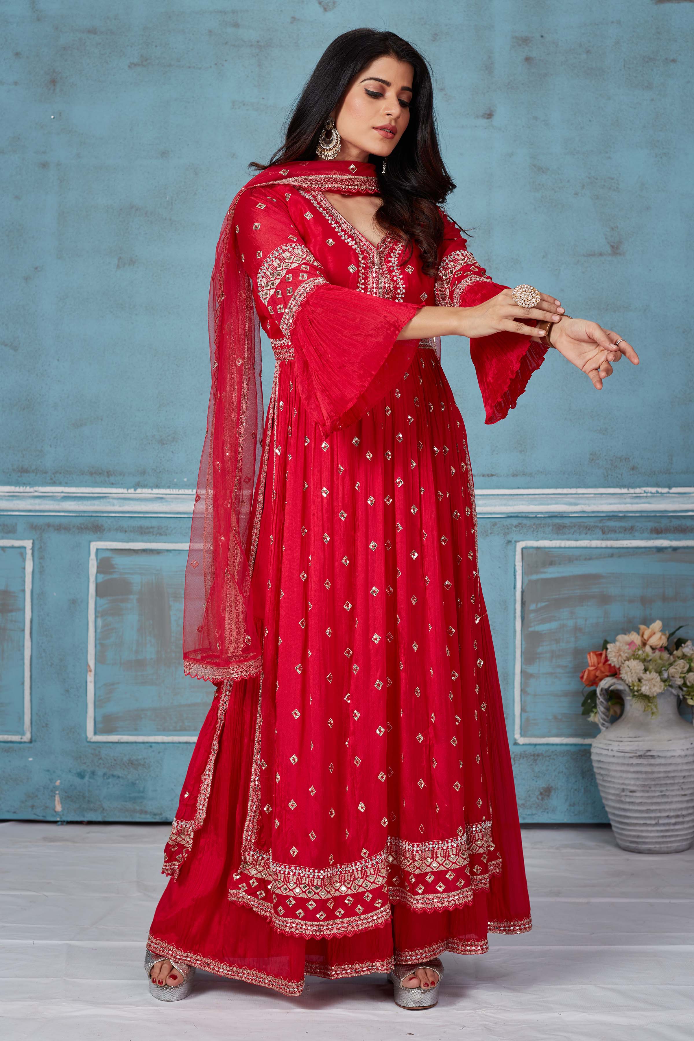 Shop red embroidered georgette palazzo online in USA with dupatta. Look royal on special occasions in exquisite designer lehengas, pure silk sarees, handloom sarees, Bollywood sarees, Anarkali suits, Banarasi sarees, organza sarees from Pure Elegance Indian saree store in USA.-side