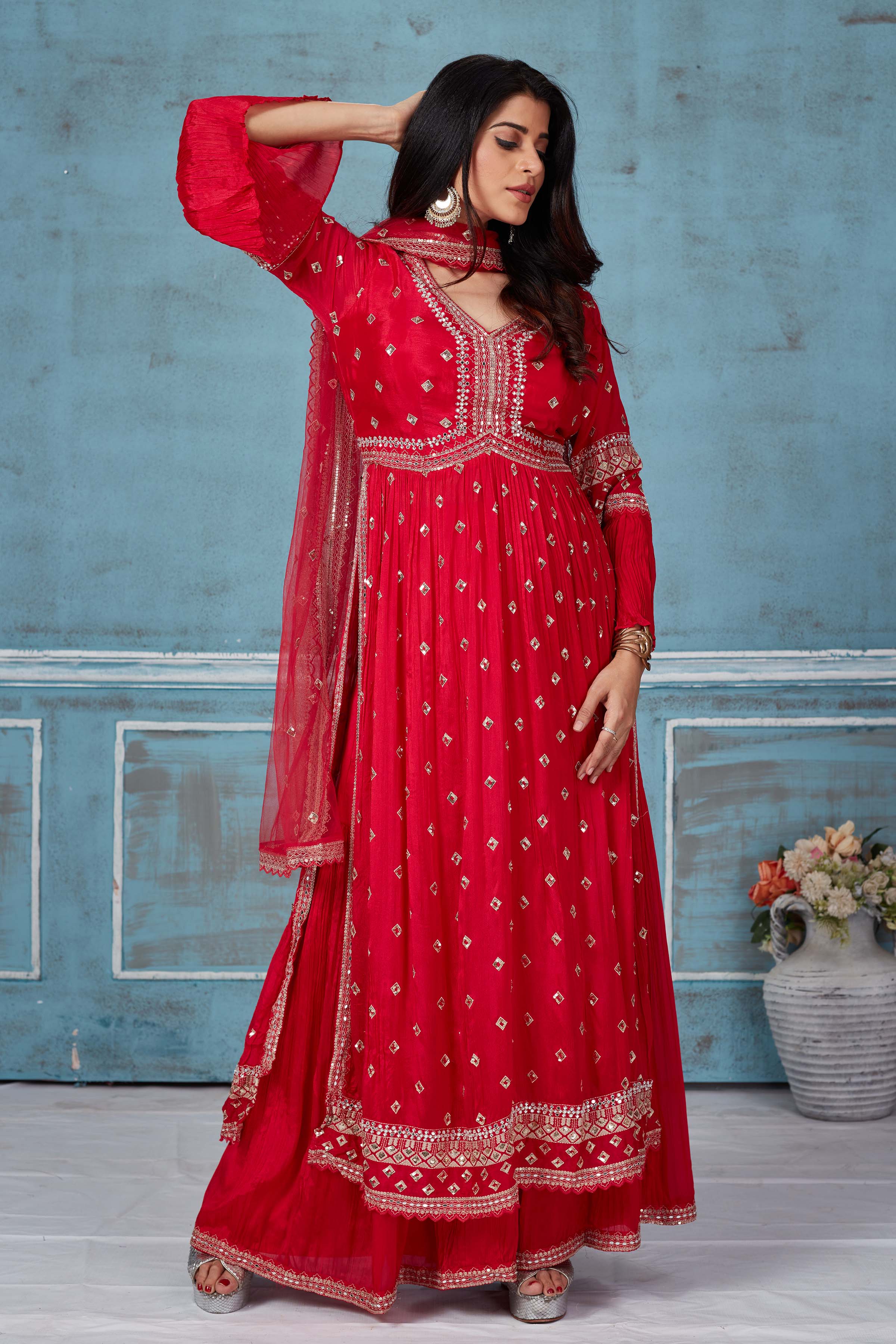 Shop red embroidered georgette palazzo online in USA with dupatta. Look royal on special occasions in exquisite designer lehengas, pure silk sarees, handloom sarees, Bollywood sarees, Anarkali suits, Banarasi sarees, organza sarees from Pure Elegance Indian saree store in USA.-front