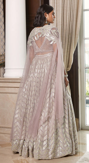Buy silver net georgette embroidered lehenga online in USA with attached dupatta. Look royal on special occasions in exquisite designer lehengas, pure silk sarees, handloom sarees, Bollywood sarees, Anarkali suits, Banarasi sarees, organza sarees from Pure Elegance Indian saree store in USA.-back