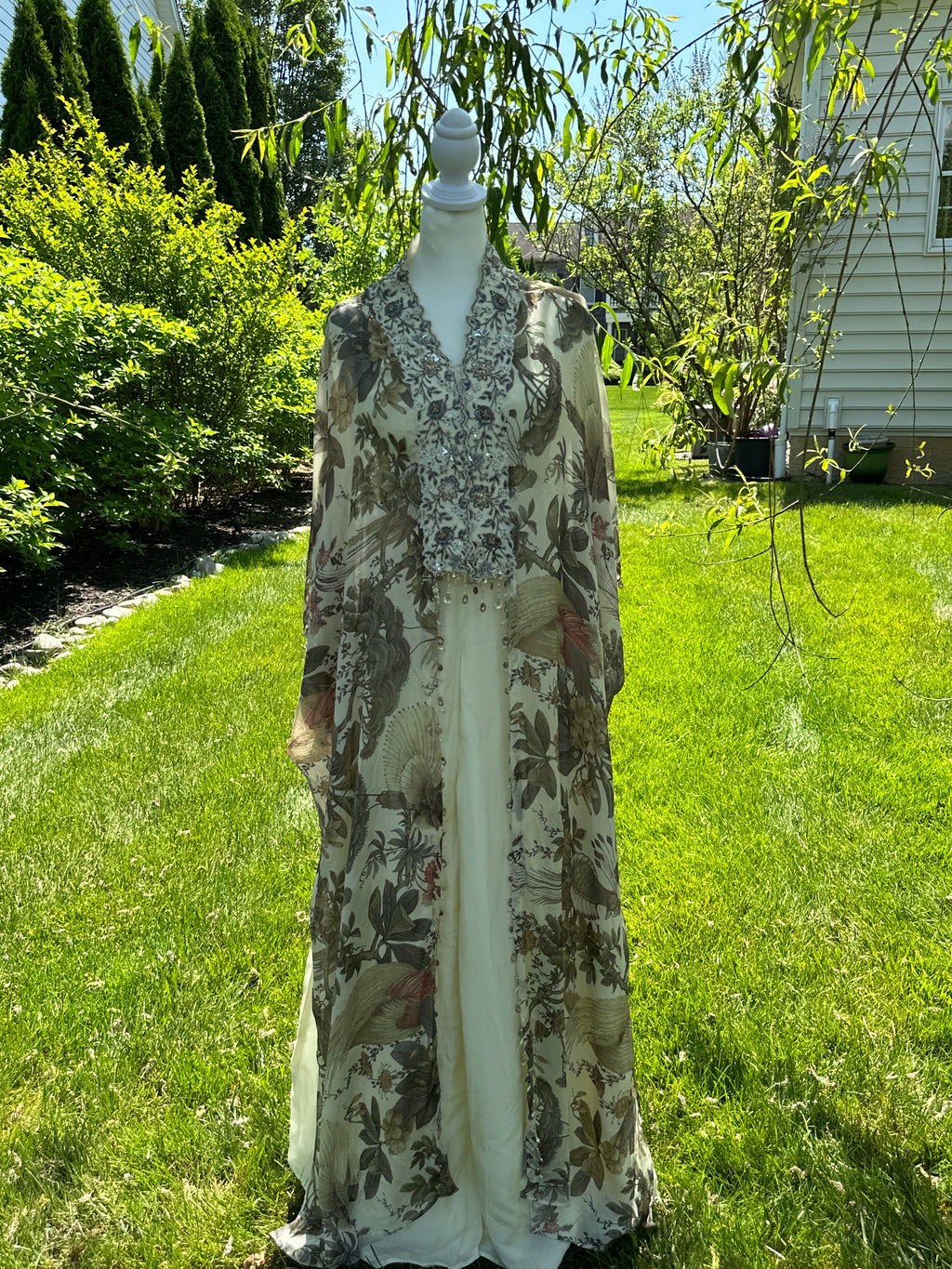 Shop cream crop top and palazzo online in USA with floral shrug. Look your best on festive occasions in latest designer suits, Banarasi sarees, handwoven sarees.- full view