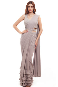 Buy grey georgette ruffle drape saree online in USA with embellished blouse. Look your best at parties and weddings in beautiful designer sarees, embroidered sarees, handwoven sarees, silk sarees, organza saris from Pure Elegance Indian saree store in USA.-full view