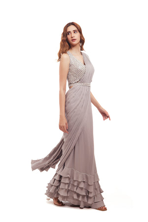 Buy grey georgette ruffle drape saree online in USA with embellished blouse. Look your best at parties and weddings in beautiful designer sarees, embroidered sarees, handwoven sarees, silk sarees, organza saris from Pure Elegance Indian saree store in USA.-side