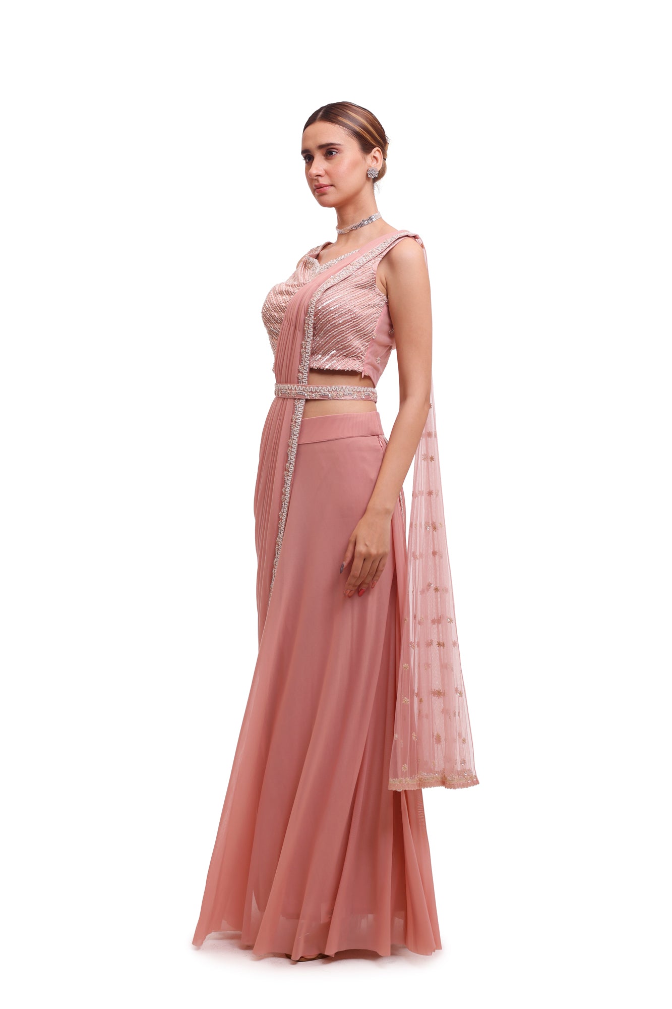 Buy stunning light pink draped lycra saree online in USA with embellished blouse. Look your best at parties and weddings in beautiful designer sarees, embroidered sarees, handwoven sarees, silk sarees, organza saris from Pure Elegance Indian saree store in USA.-saree