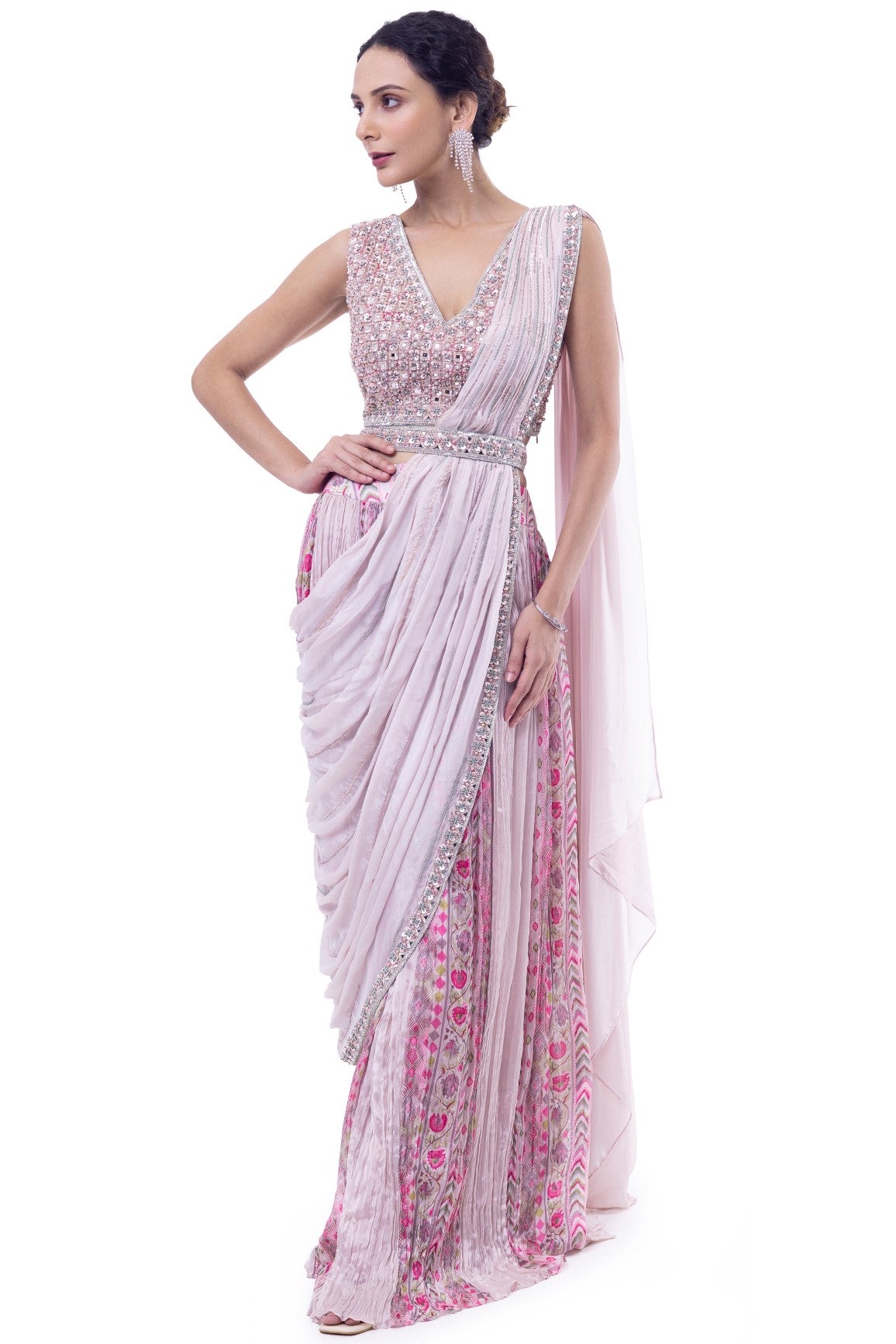 Shop light pink pre-draped chiffon saree online in USA with embellished blouse. Look your best at parties and weddings in beautiful designer sarees, embroidered sarees, handwoven sarees, silk sarees, organza saris from Pure Elegance Indian saree store in USA.-full view