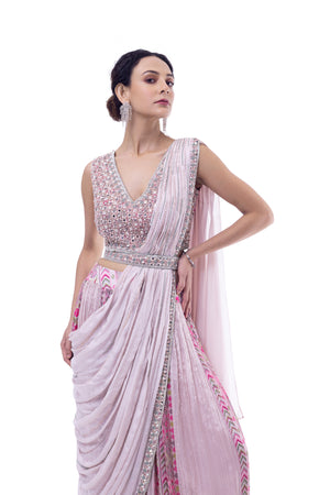 Shop light pink pre-draped chiffon saree online in USA with embellished blouse. Look your best at parties and weddings in beautiful designer sarees, embroidered sarees, handwoven sarees, silk sarees, organza saris from Pure Elegance Indian saree store in USA.-closeup