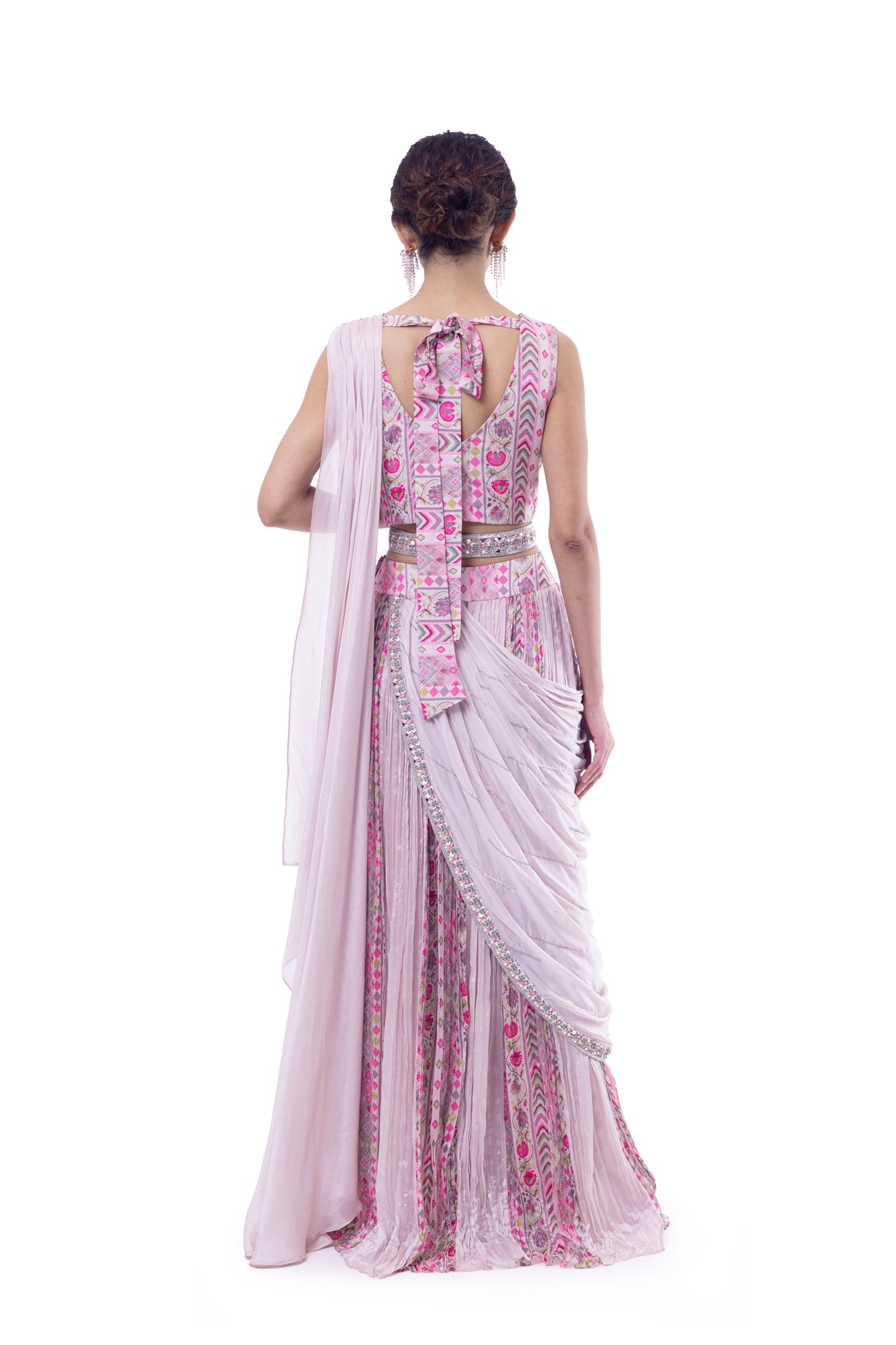Shop light pink pre-draped chiffon saree online in USA with embellished blouse. Look your best at parties and weddings in beautiful designer sarees, embroidered sarees, handwoven sarees, silk sarees, organza saris from Pure Elegance Indian saree store in USA.-back