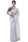 Shop silver embroidered organza saree online in USA with blue blouse. Look your best at parties and weddings in beautiful designer sarees, embroidered sarees, handwoven sarees, silk sarees, organza saris from Pure Elegance Indian saree store in USA.-full view