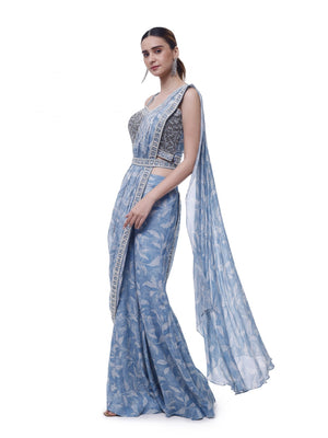 Shop light blue floral chiffon sharara drape saree online in USA. Look your best at parties and weddings in beautiful designer sarees, embroidered sarees, handwoven sarees, silk sarees, organza saris from Pure Elegance Indian saree store in USA.-side
