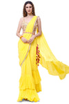 Shop beautiful yellow georgette ruffle sharara drape saree online in USA with blouse. Look your best at parties and weddings in beautiful designer sarees, embroidered sarees, handwoven sarees, silk sarees, organza saris from Pure Elegance Indian saree store in USA.-full view