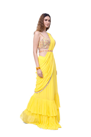Shop beautiful yellow georgette ruffle sharara drape saree online in USA with blouse. Look your best at parties and weddings in beautiful designer sarees, embroidered sarees, handwoven sarees, silk sarees, organza saris from Pure Elegance Indian saree store in USA.-saree