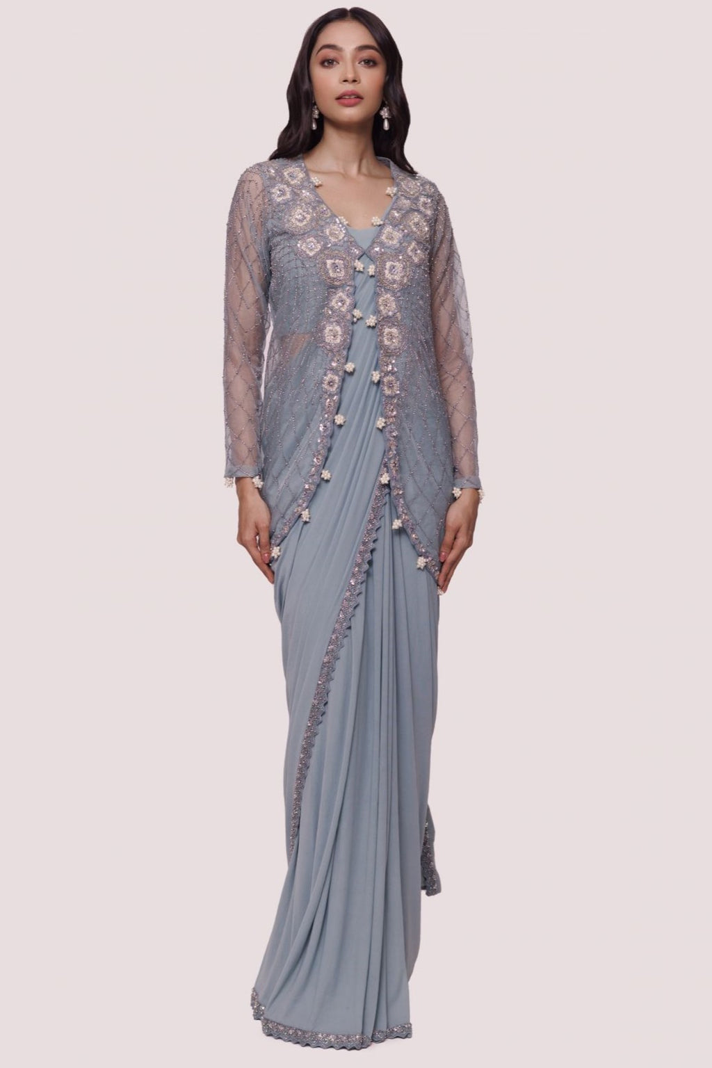 Shop doctor blue lycra drape saree online in USA with embellished jacket. Look your best at parties and weddings in beautiful designer sarees, embroidered sarees, handwoven sarees, silk sarees, organza saris from Pure Elegance Indian saree store in USA.-full view