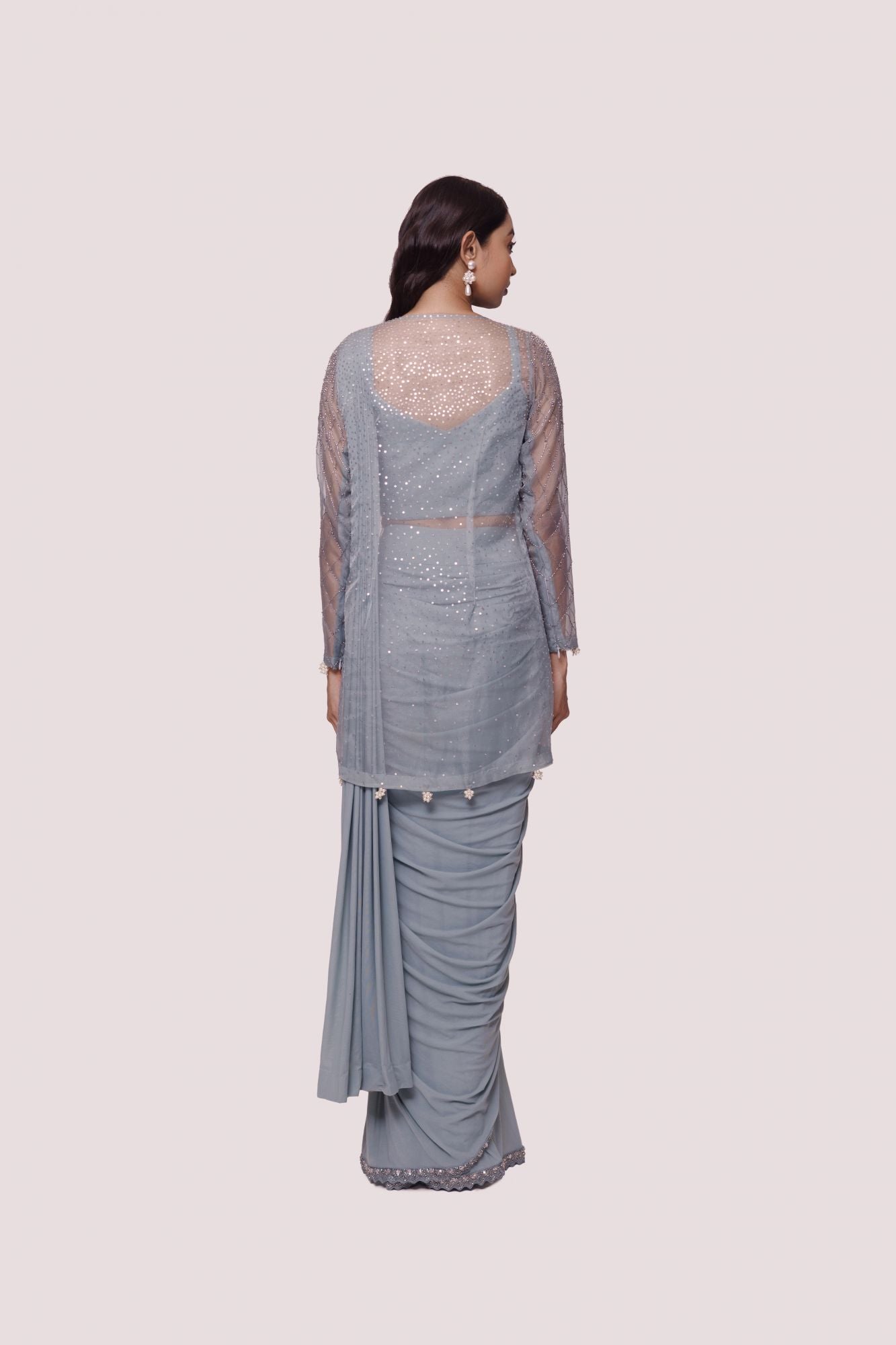 Shop doctor blue lycra drape saree online in USA with embellished jacket. Look your best at parties and weddings in beautiful designer sarees, embroidered sarees, handwoven sarees, silk sarees, organza saris from Pure Elegance Indian saree store in USA.-back