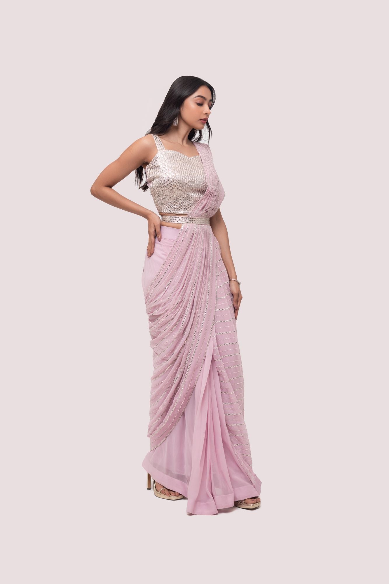 Shop stunning powder pink embroidered drape saree online in USA with blouse. Look your best at parties and weddings in beautiful designer sarees, embroidered sarees, handwoven sarees, silk sarees, organza saris from Pure Elegance Indian saree store in USA.-side