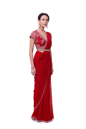 Shop ruby red zardozi lycra net drape saree online in USA with blouse. Look your best at parties and weddings in beautiful designer sarees, embroidered sarees, handwoven sarees, silk sarees, organza saris from Pure Elegance Indian saree store in USA.-side