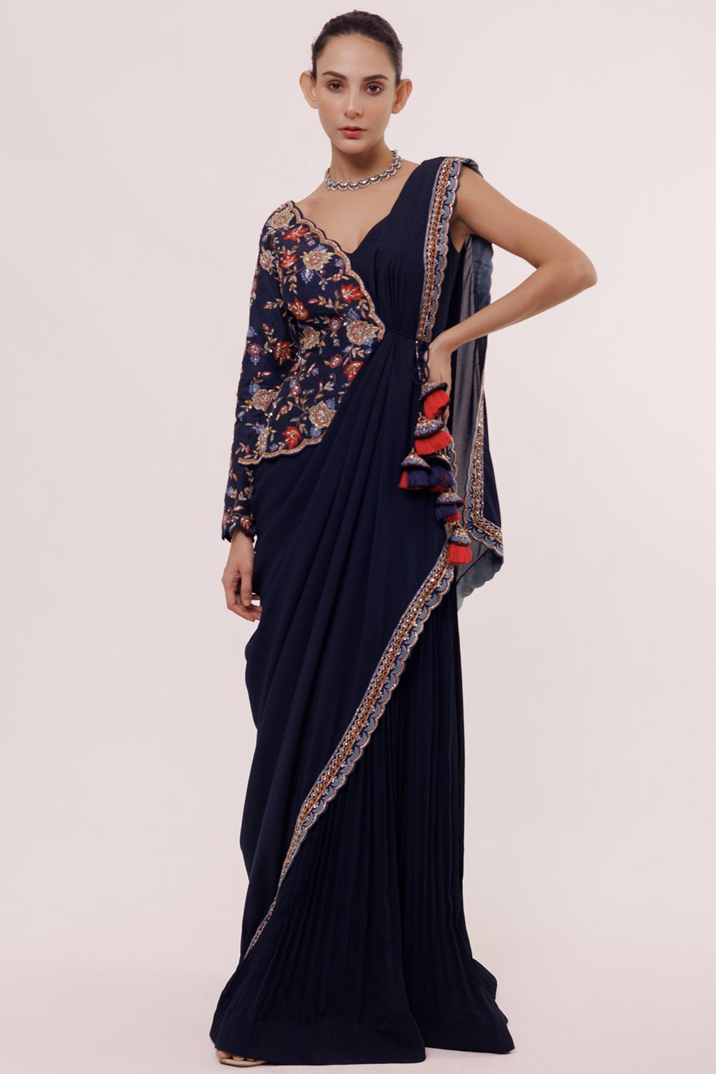 Shop beautiful navy blue drape saree online in USA with embroidered faux jacket. Look your best at parties and weddings in beautiful designer sarees, embroidered sarees, handwoven sarees, silk sarees, organza saris from Pure Elegance Indian saree store in USA.-full view