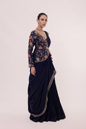 Shop beautiful navy blue drape saree online in USA with embroidered faux jacket. Look your best at parties and weddings in beautiful designer sarees, embroidered sarees, handwoven sarees, silk sarees, organza saris from Pure Elegance Indian saree store in USA.-saree